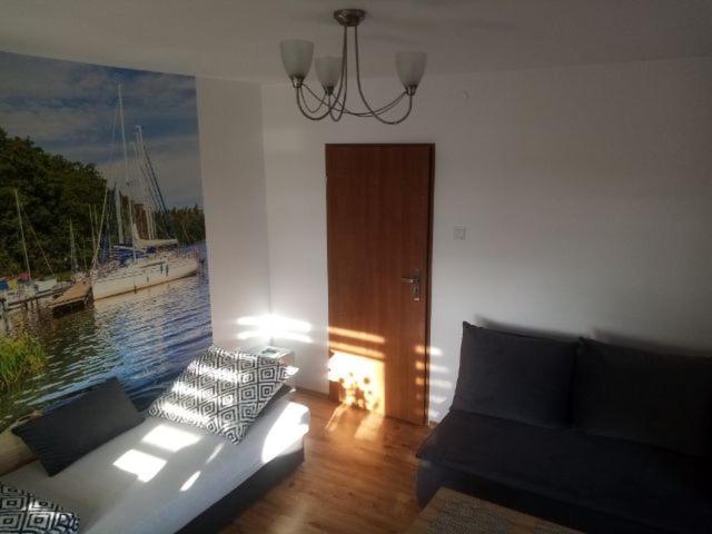 Appartement Wynajem Pokoi Wiki à Mikołajki Extérieur photo